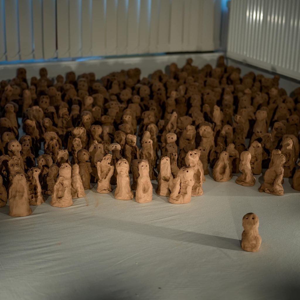 A photograph of many clay creatures grouped together